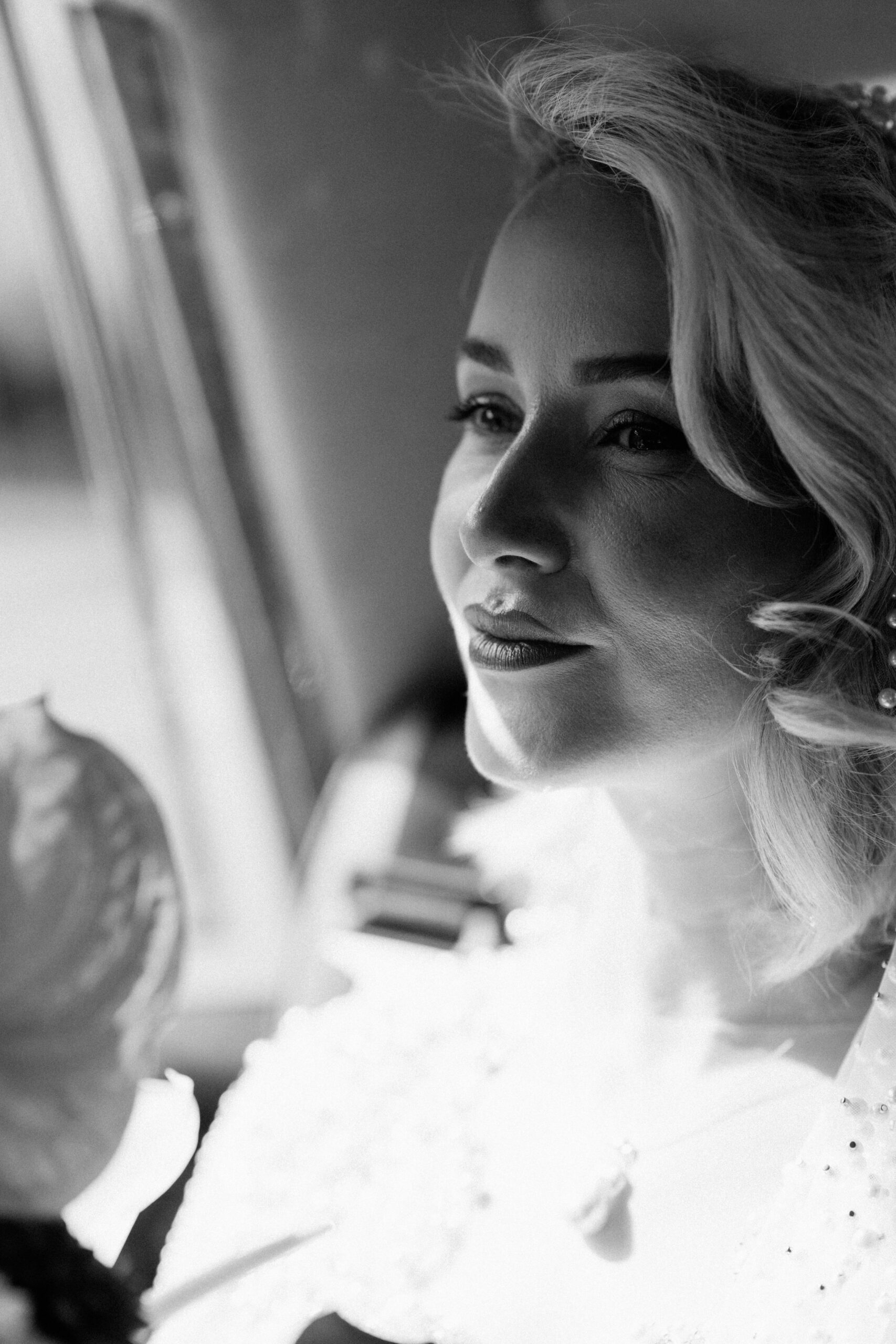 timeless wedding o photographer in Scotland black and white image of beautiful bride in natural window light