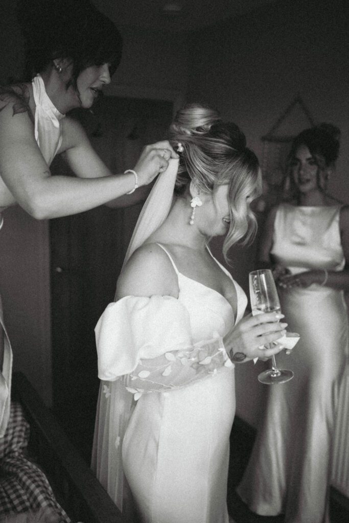 Black and white bridal preparation photography Scotland bride getting ready moment