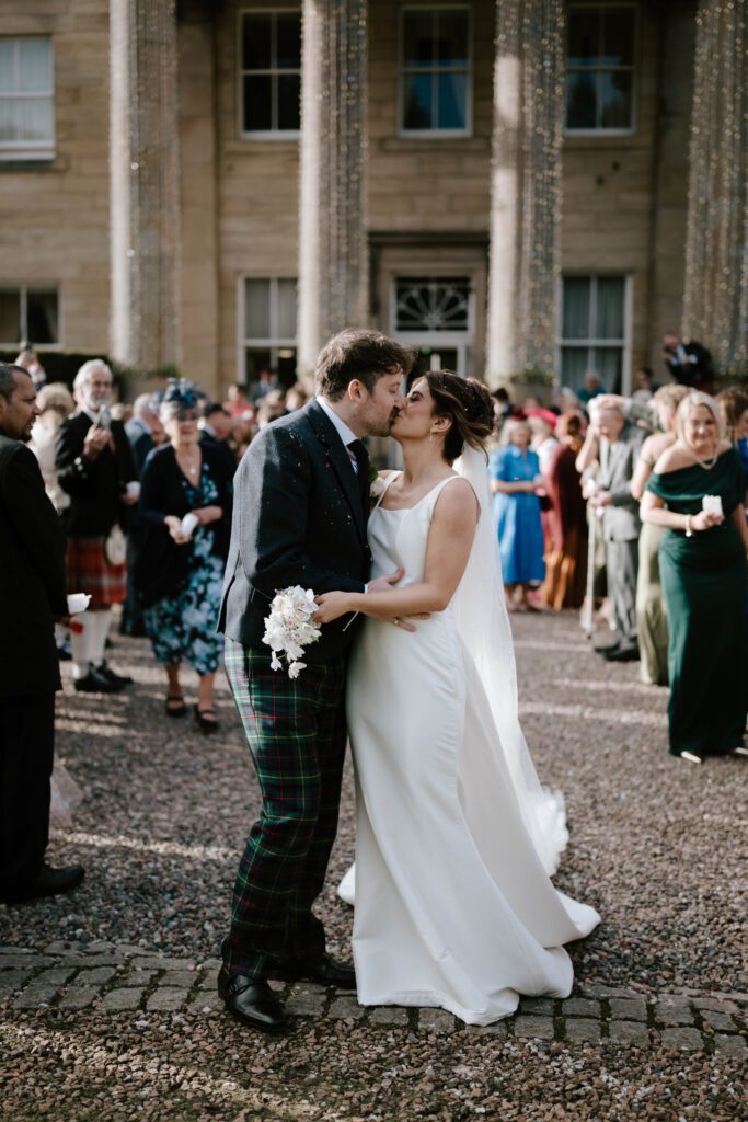 Bride and Groom walking Balbirnie House hotel, elegant Scotland wedding photography