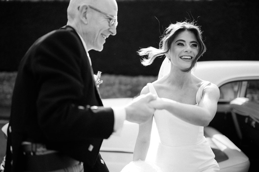 Black and white wedding photography Scotland candid bride joyful moment