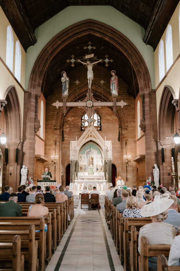 Scottish church wedding ceremony photography Scotland aisle view architecture